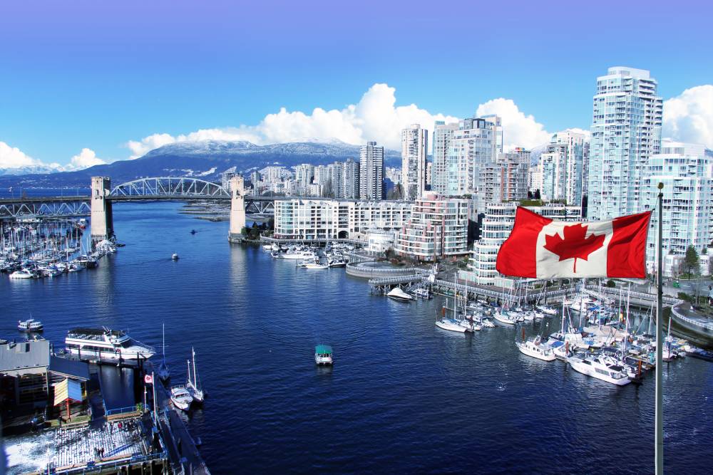 Canadian flag flying over Vancouver